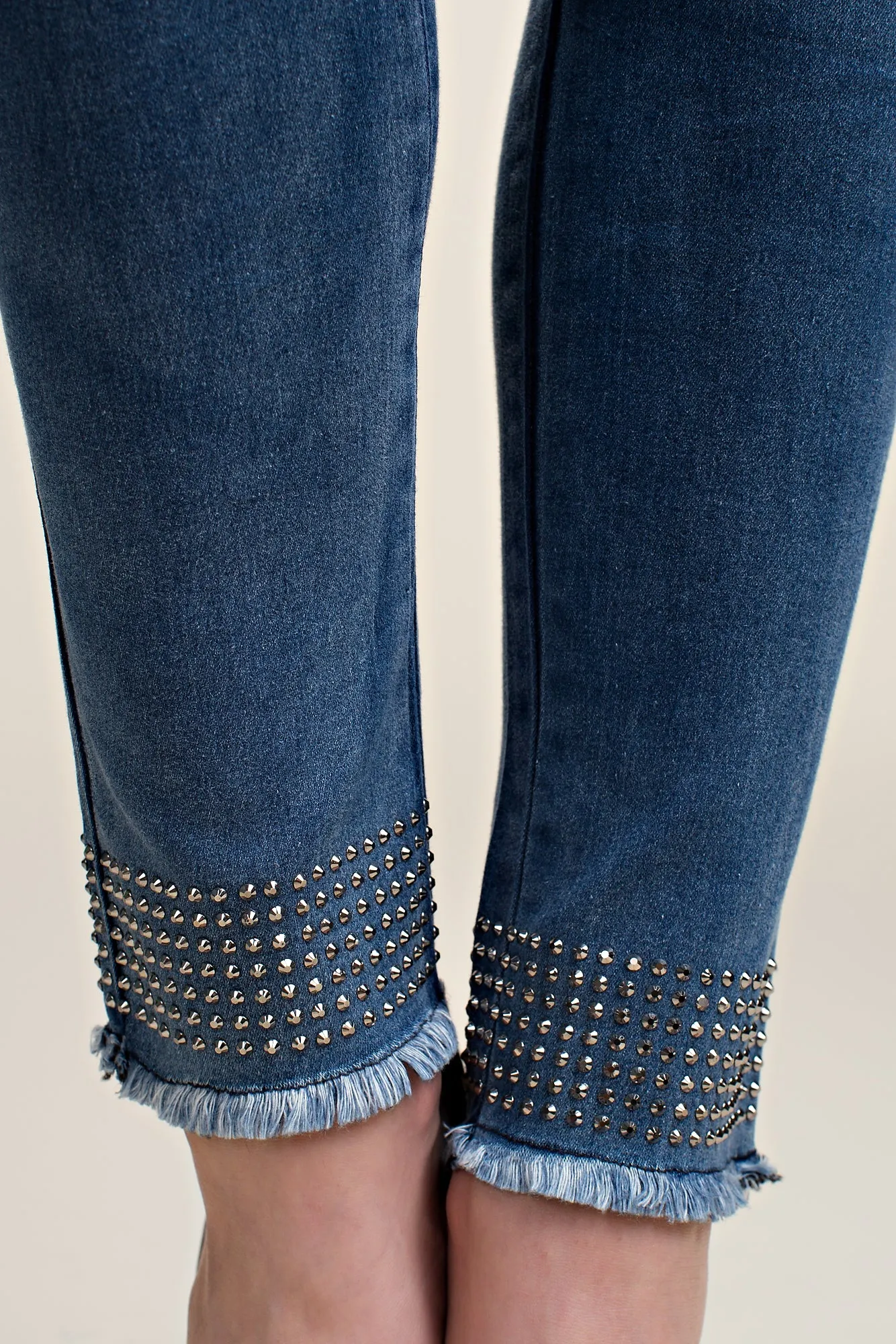 Secure fit Side slits Jeggings with Rhinestone Raw Hem Detail